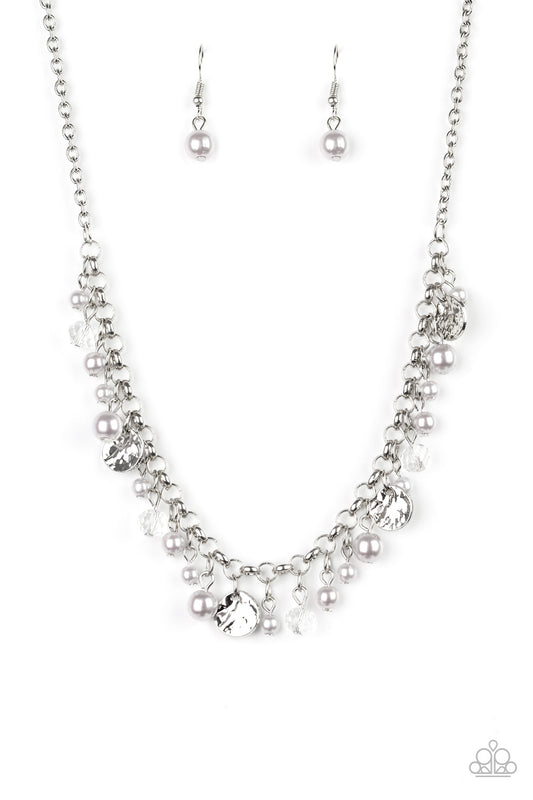 Pearly silver beads, smoky crystal-like gems, and hammered silver discs swing from a bold silver chain, creating a refined fringe below the collar. Features an adjustable clasp closure.  Sold as one individual necklace. Includes one pair of matching earrings.