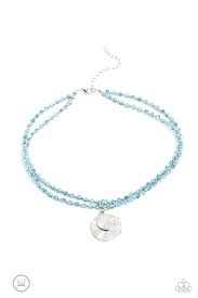 Two strands of faceted blue beads, brushed in a blue iridescent coating, alternate with silver studs as they coalesce around the collar for a vibrant pop of color. Two hammered silver discs in varying sizes dangle below the colorful concoction for a subtle layering effect. Features an adjustable clasp closure. Due to its prismatic palette, color may vary.  Sold as one individual choker necklace. Includes one pair of matching earrings.