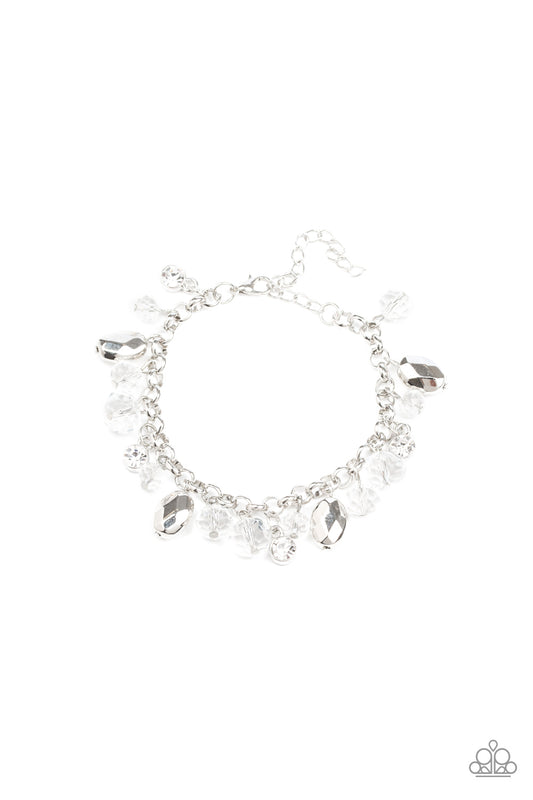 A glittery collection of sparkling white rhinestones, faceted silver beads, and glassy crystal-like beads dangle from the wrist, creating a refined fringe. Features an adjustable clasp closure.

Sold as one individual bracelet.