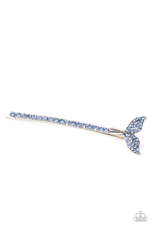 A blue rhinestone studded mermaid fin adorns the corner of a bobby pin that is adorned in matching blue rhinestones for a fairytale finish.  Sold as one individual decorative bobby pin.
