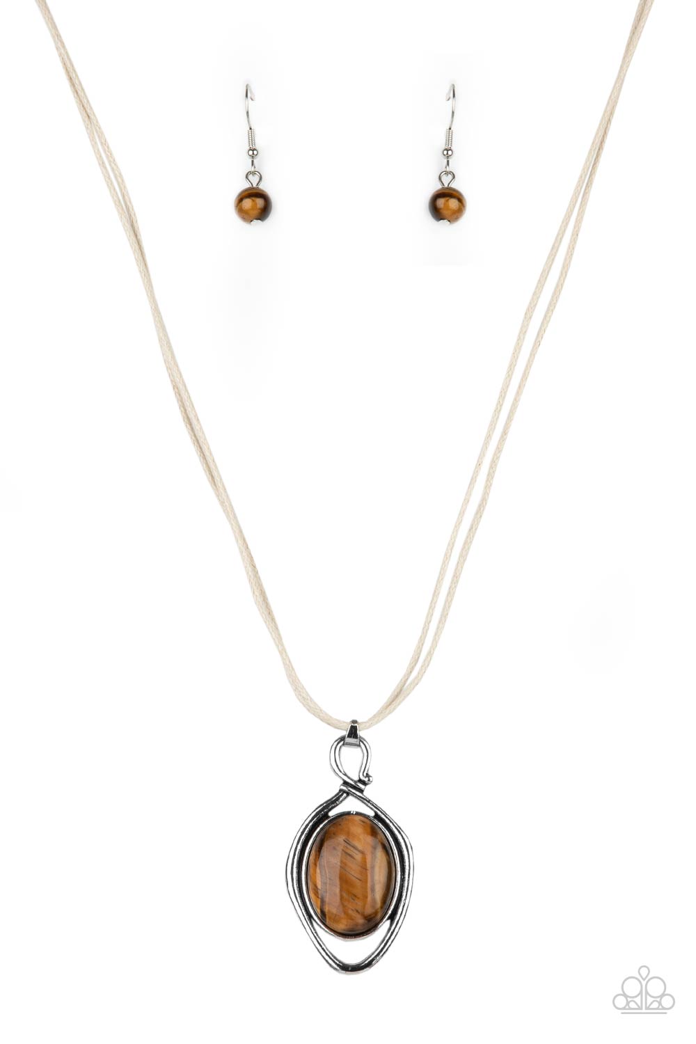 An oversized tiger's eye stone is pressed into a silver oval frame and outlined with an unexpected irregular shaped frame. The eye-catching pendant suspends from a double strand of white cord below the collar for a mysterious finish. Features an adjustable clasp closure.  Sold as one individual necklace.