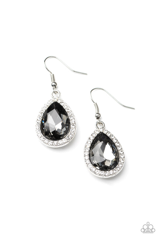 A smoky teardrop gem is pressed into the center of a silver teardrop frame encrusted in glassy white rhinestones, creating dramatic sparkle. Earring attaches to a standard fishhook fitting.  Sold as one pair of earrings.