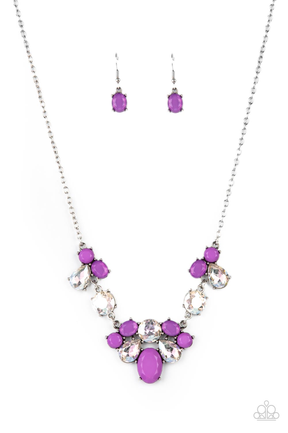 Varying in opacity and shape, mismatched purple beads attach to oversized white rhinestones, creating bubbly frames that delicately link into an ethereal display below the collar. Features an adjustable clasp closure  Sold as one individual necklace. Includes one pair of matching earrings.