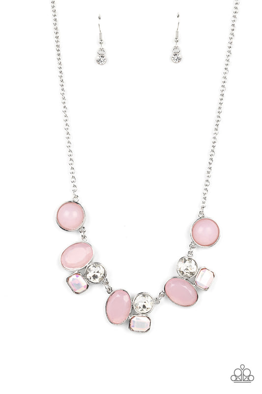 Opaque Baby Pink beads in perfectly polished circles and faceted ovals are pressed into silver frames as they connect with exaggerated classic white rhinestones stacked above emerald cut iridescent gems to create an intricate geometric display. Features an adjustable clasp closure. Due to its prismatic palette, color may vary.  Sold as one individual necklace. Includes one pair of matching earrings.