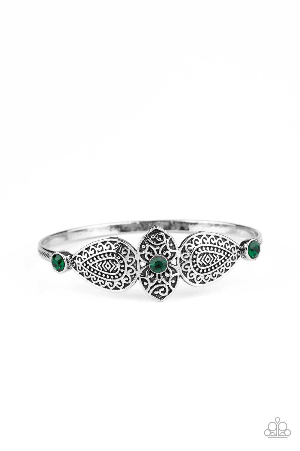 Embossed in decorative filigree, leafy silver frames connect into a whimsical centerpiece atop a silver bangle. Glittery green rhinestones dot the ornate centerpiece, adding colorful sparkle to the dainty piece.  Sold as one individual bracelet.