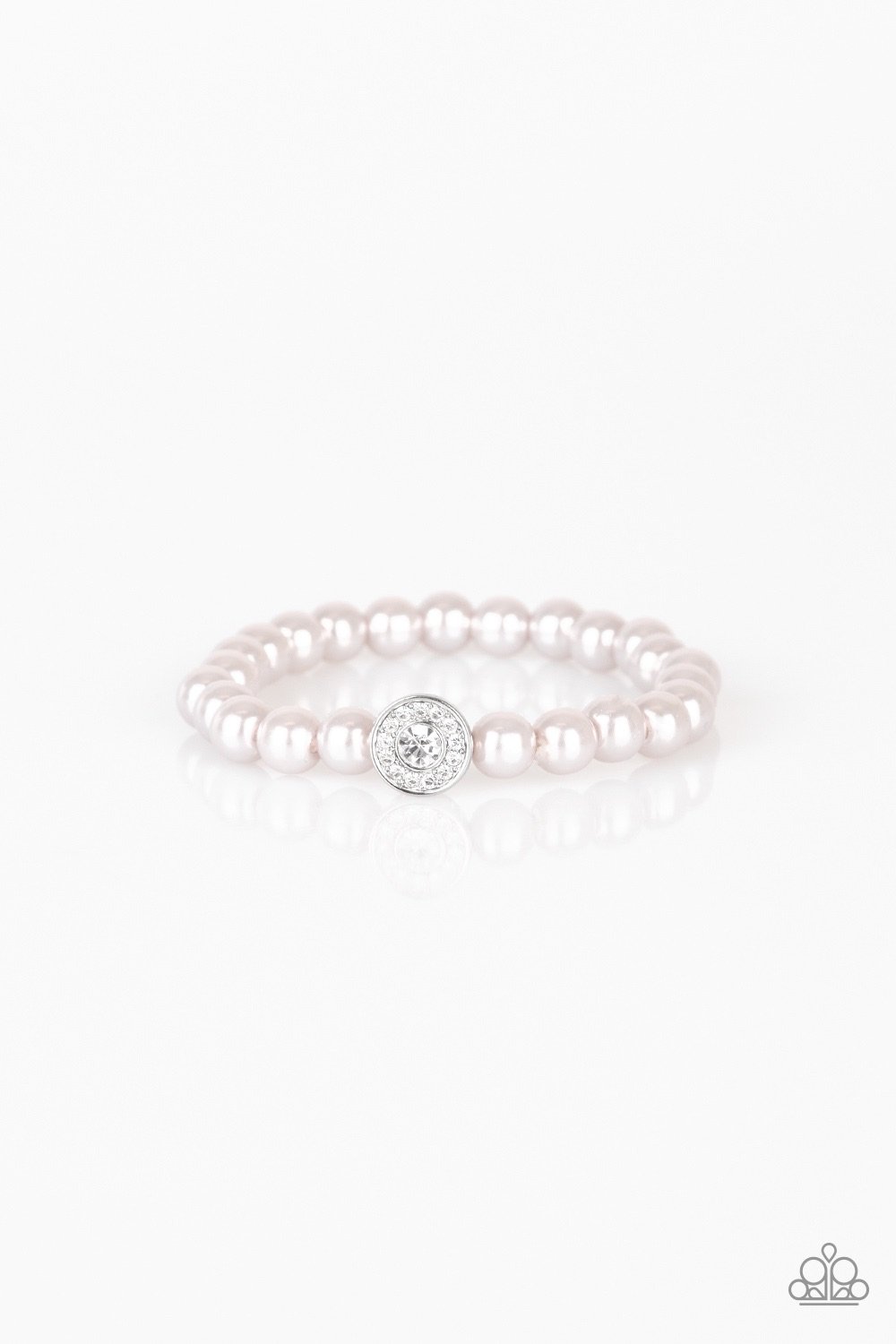 Silver pearls and a white rhinestone encrusted silver charm are threaded along a stretchy band, creating a glamorous centerpiece atop the wrist.

Sold as one individual bracelet.