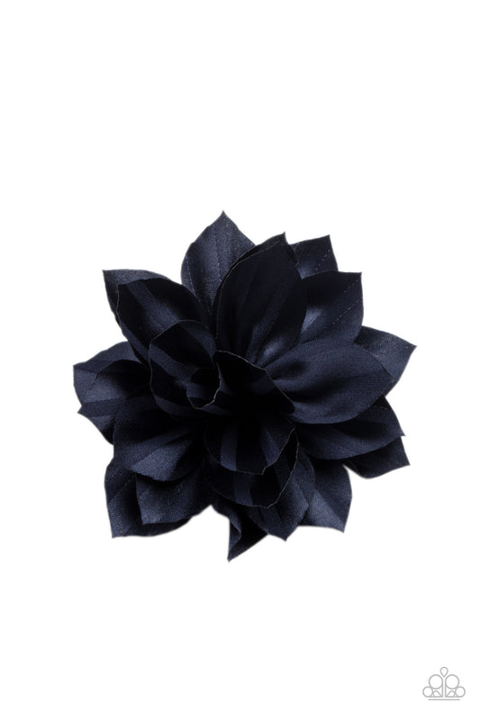 Blue ribbon-like petals gather into a satin blossom, creating an elegant display. Features a standard hair clip on the back.  Sold as one individual hair clip.