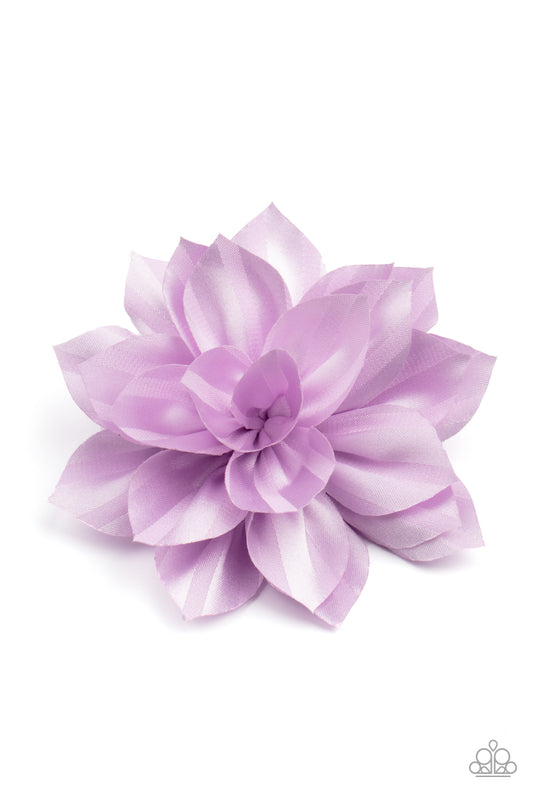 Purple ribbon-like petals gather into a satin blossom, creating an elegant display. Features a standard hair clip on the back.  Sold as one individual hair clip.