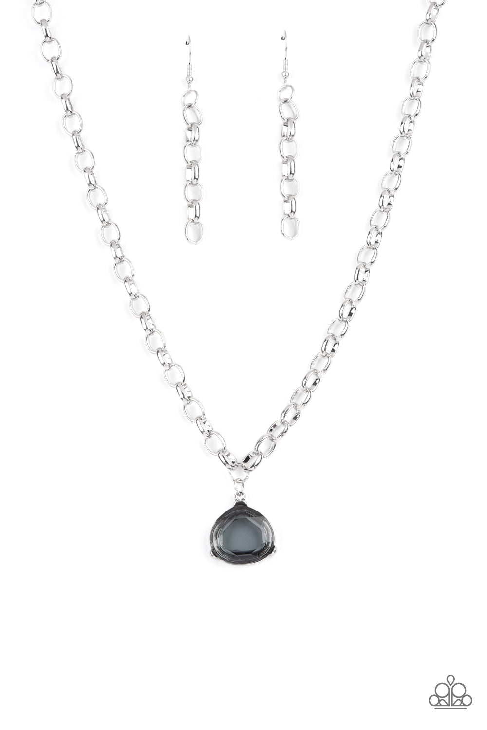 An oversized smoky gem is pressed into a pronged silver fitting at the bottom of a chunky silver chain, creating a dramatic pendant below the collar. Features an adjustable clasp closure.  Sold as one individual bracelet.