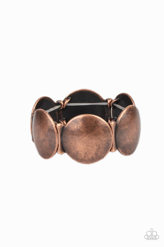 Infused with curved bar-like accents, an antiqued series of beveled copper discs are threaded along stretchy bands around the wrist for a bubbly metallic look.  Sold as one individual bracelet.