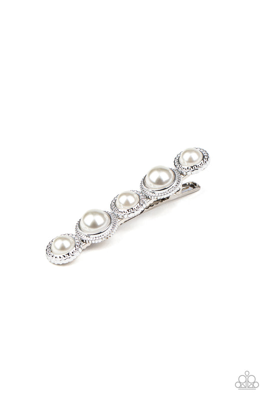 Featuring ornate silver fittings, a refined collection of pearly white beads are encrusted across the front of a classic hair clip, creating a timeless centerpiece. Features a standard hair clip.  Sold as one individual hair clip.