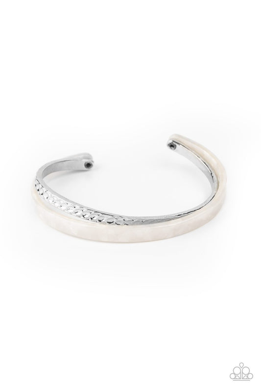 Featuring a marble-like finish, a white acrylic frame curls around a dainty silver cuff, creating a colorfully stacked look across the wrist.  Sold as one individual bracelet.