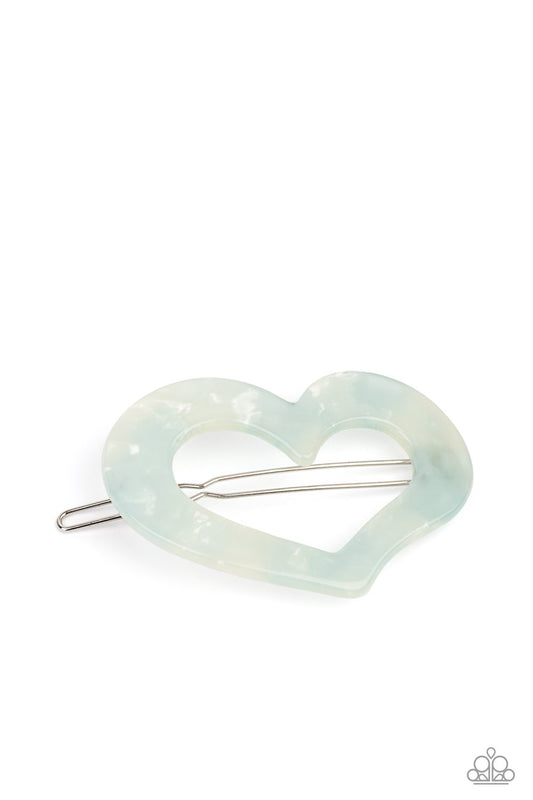 Flecked in iridescent shell-like shimmer, a blue acrylic heart frame pulls back the hair in a flirty fashion. Features a clamp barrette closure.  Sold as one individual hair clip.