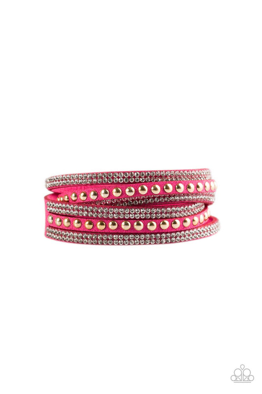 Rows of glassy white rhinestones and glistening gold studs are pressed along three strands of pink suede for a sassy look. The elongated band allows for a trendy double wrap design. Features an adjustable snap closure.  Sold as one individual bracelet.