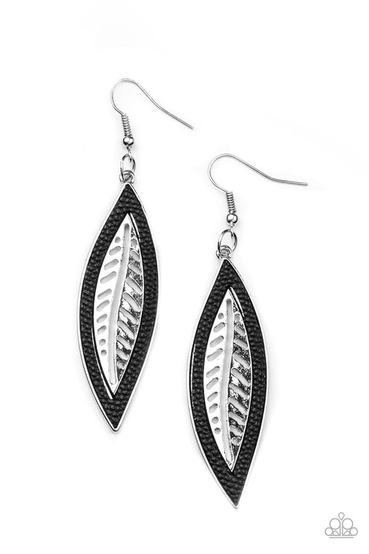 Bordered in black leather trim, an airy silver leaf frame swings from the ear for a wildly seasonal fashion. Earring attaches to a standard fishhook fitting.  Sold as one pair of earrings.