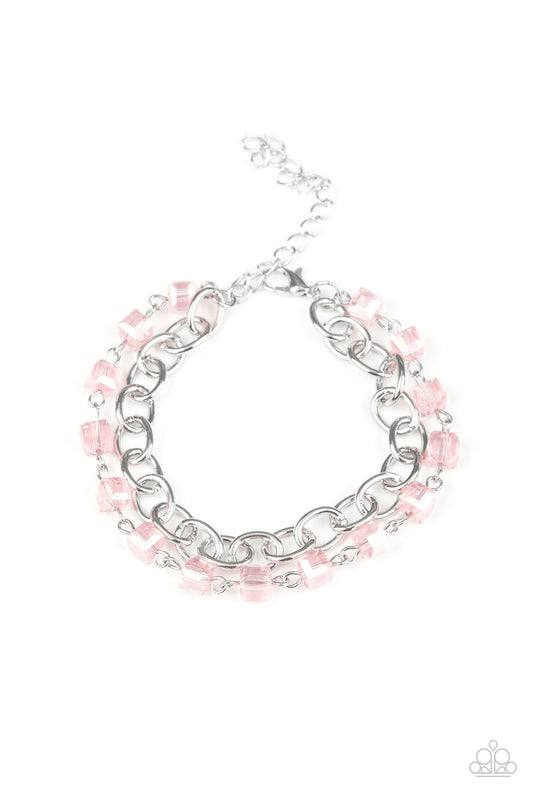 A strand of glittery pink crystal-like cube beading joins a classic strand of silver chain around the wrist, creating refined layers. Features an adjustable clasp closure.  Sold as one individual bracelet.
