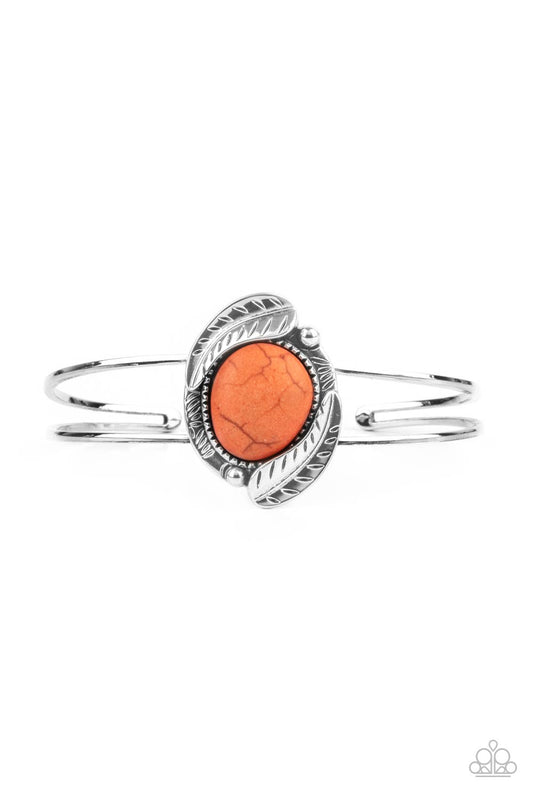 Feathery silver frames nestled around a refreshing orange stone center, creating a seasonal centerpiece atop a dainty silver cuff.  Sold as one individual bracelet.