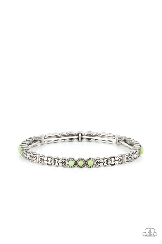 Stamped and studded in floral and arrow patterns, dainty silver frames adorned in trios of smooth green stones are threaded along stretchy bands around the wrist for a colorfully seasonal look.

Sold as one individual bracelet.