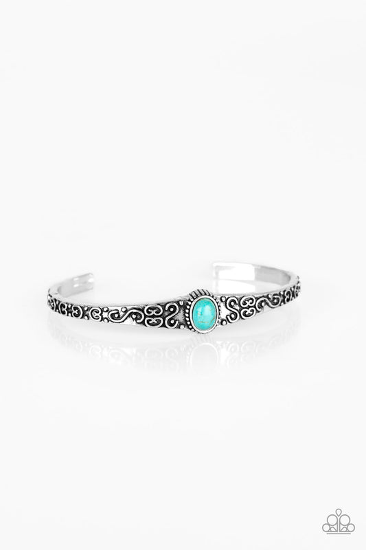 Infused with a refreshing turquoise stone center, a dainty silver cuff has been embossed in swirling antiqued detail for a seasonal look.  Sold as one individual bracelet.