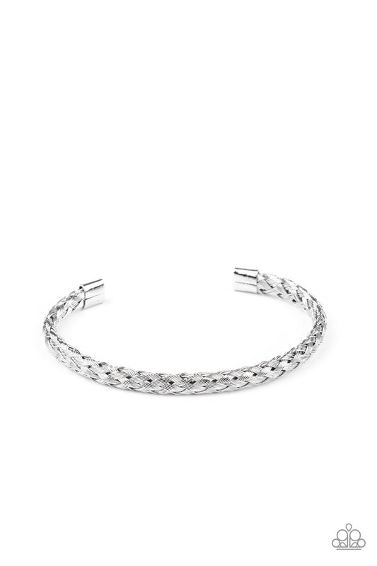 Capped in silver fittings, textured silver bars delicately weave and braid across the wrist for a sleek urban look.  Sold as one individual bracelet.