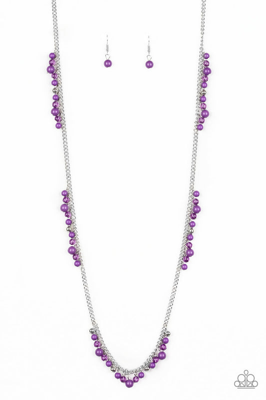Sections of shiny silver, polished purple, and glassy beads trickle along a shimmery silver chain along the chest for a flirtatious look. Features an adjustable clasp closure.  Sold as one individual necklace. Includes one pair of matching earrings.