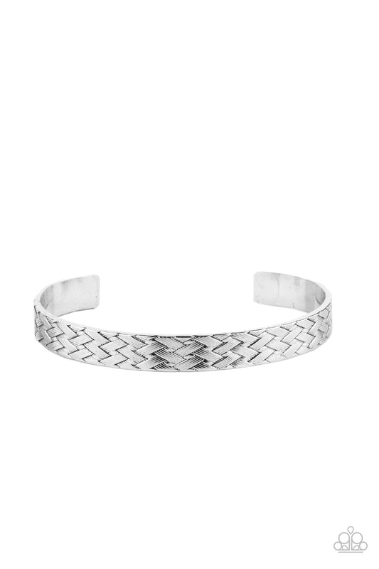 Embossed in braided metallic textures, an antiqued silver cuff curls around the wrist for a rustic finish.  Sold as one individual bracelet.