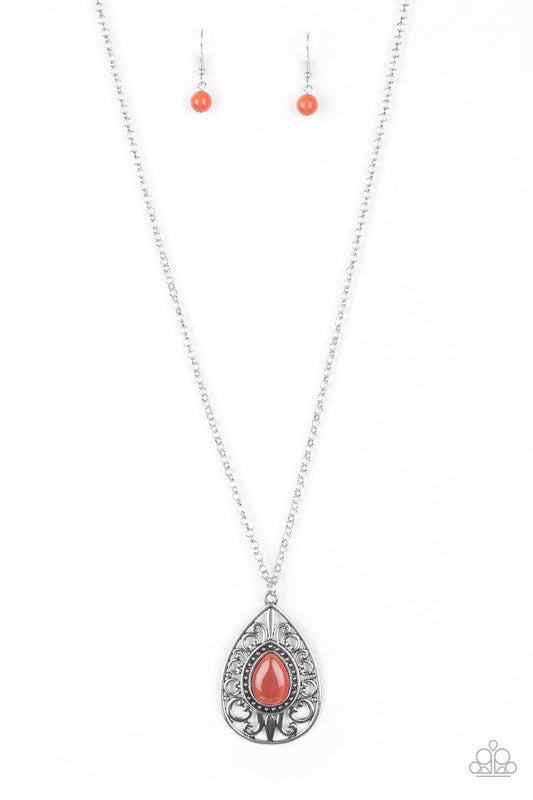 A glowing orange moonstone is pressed into the center of a silver teardrop pendant swirling with regal filigree for a regal finish. Features an adjustable clasp closure.  Sold as one individual necklace. Includes one pair of matching earrings.
