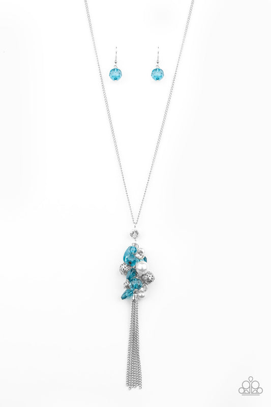A fabulous collision of blue crystal-like beads, white rhinestones, white pearls, and ornate silver beads delicately cluster at the bottom of a lengthened silver chain for a colorfully vintage look. A silver chain tassel swings from the bottom of the display, adding a flirtatious movement to the whimsical piece. Features an adjustable clasp closure.  Sold as one individual necklace. Includes one pair of matching earrings.