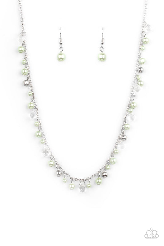 Soft pastel Green Ash pearls dangle alongside dainty silver and faceted glass beads as they float gracefully below the collar on a silver chain. Features an adjustable clasp closure.  Sold as one individual necklace. Includes one pair of matching earrings.