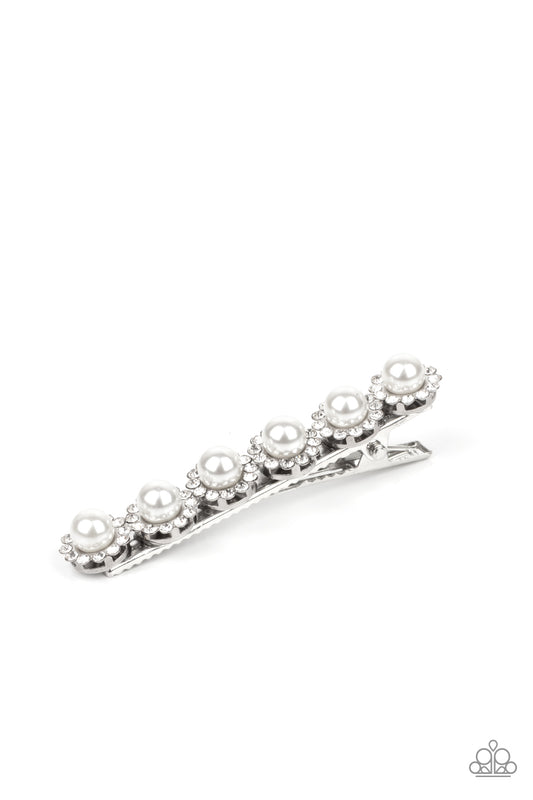 Bordered in rings of dainty white rhinestones, pearly white beads embellish the front of a silver hair clip for a timeless finish.  Sold as one individual hair clip.