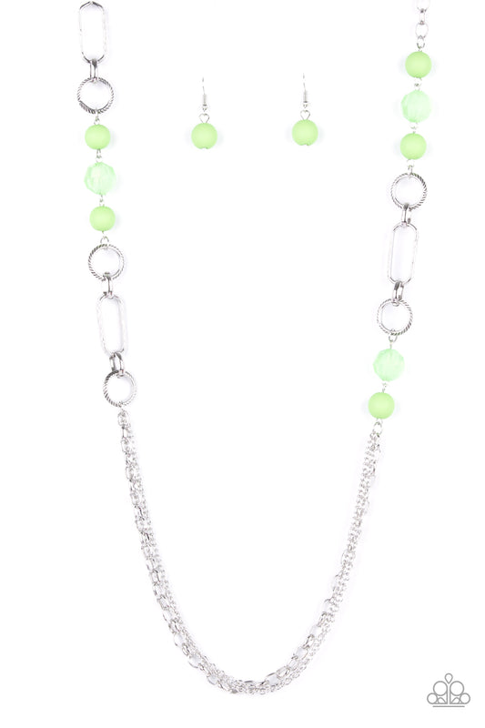 Apple green opaque round beads and transparent faceted beads playfully accent textured round and oval hoops midway down a large silver chain. A triple set of large and small linked chains creates a delightful finish. Features an adjustable clasp closure.  Sold as one individual necklace. Includes one pair of matching earrings.