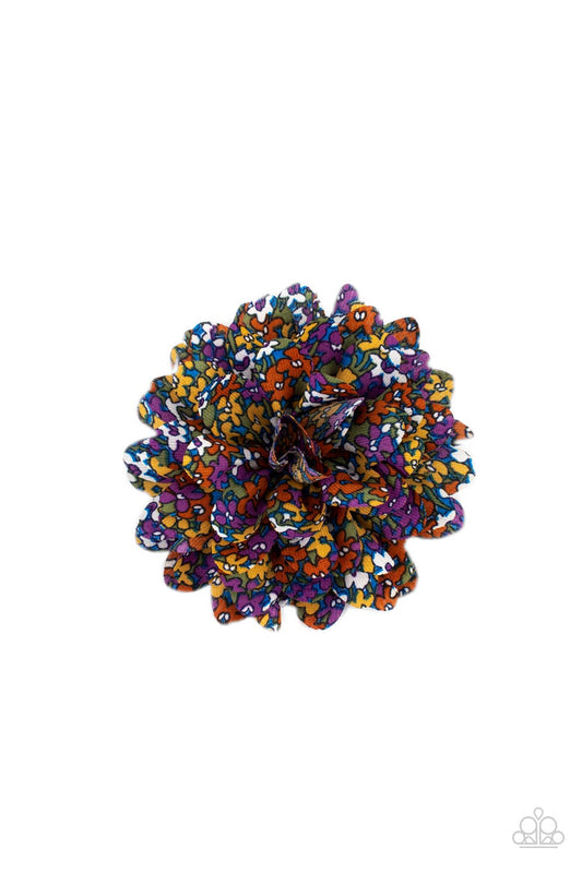 Featuring an abstract floral pattern, multicolored chiffon petals delicately layer into a boisterous blossom. Features a standard hair clip on the back.  Sold as one individual hair clip.