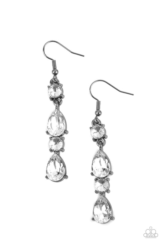 A glamorous collection of brilliant white teardrop and round rhinestones encased in classic gunmetal pronged fittings stack together creating an irresistibly refined lure. Earring attaches to a standard fishhook fitting.  Sold as one pair of earrings.