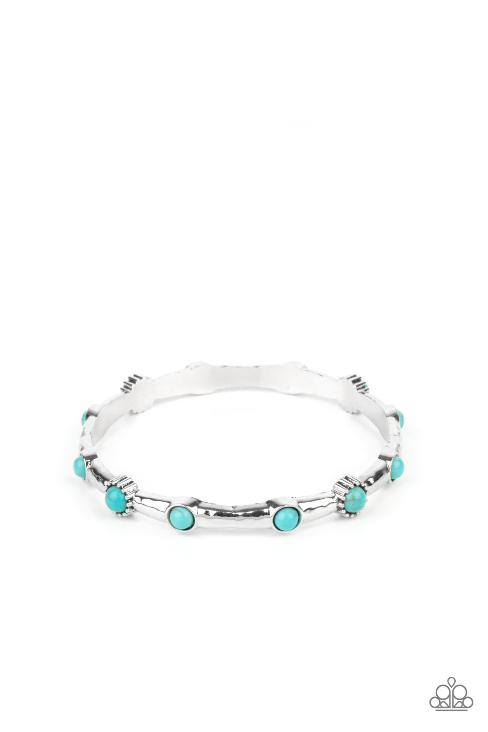 Dotted with dainty turquoise stones, a hammered silver bangle glides along the wrist for a colorfully earthy look.  Sold as one individual bracelet.