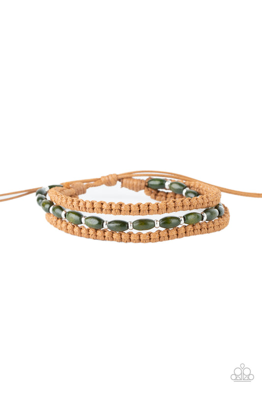Infused with dainty silver beads, a strand of green wooden beads layers with two braided rows of twine-like cording around the wrist for a colorfully layered look. Features an adjustable sliding knot closure.  Sold as an individual bracelet.
