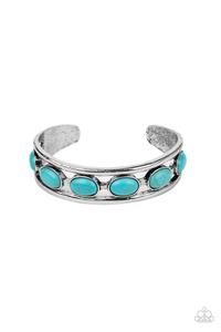 A refreshing collection of oval turquoise stones are studded across the airy center of a layered silver cuff for a rustic flair.  Sold as one individual bracelet.