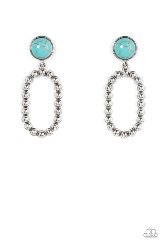 Encased in an antiqued silver fitting, a round turquoise stone gives way to a studded oval hoop for a rustic flair. Earring attaches to a standard post fitting.  Sold as one pair of post earrings.