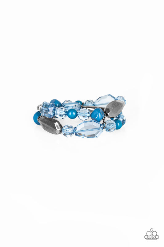 Mismatched gunmetal, polished blue, and crystal-like beads are threaded along interlocking stretchy bands for a whimsical look.

Sold as one individual bracelet.