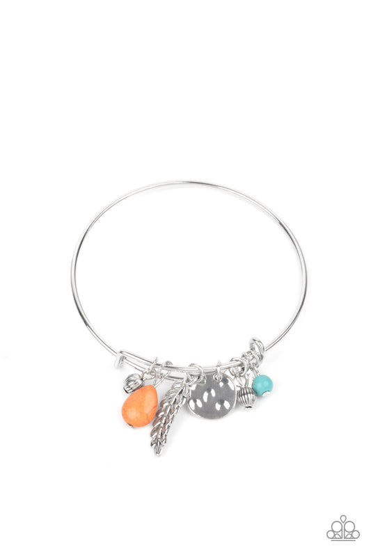 Featuring a shimmery silver feather charm, ornate silver beads and earthy stone beads glide along the fitted center of a dainty silver bangle for a whimsically charming look.  Sold as one individual bracelet.