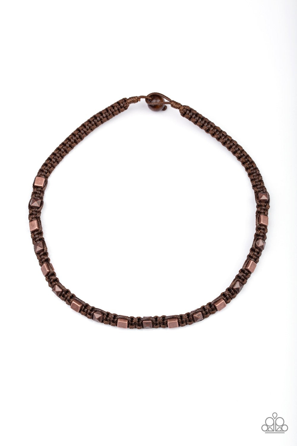 Stamped in edgy geometric patterns, rustic silver rings are knotted in place along shiny brown cording that loops around the neck for a rugged look. Features a button loop closure.  Sold as one individual necklace.