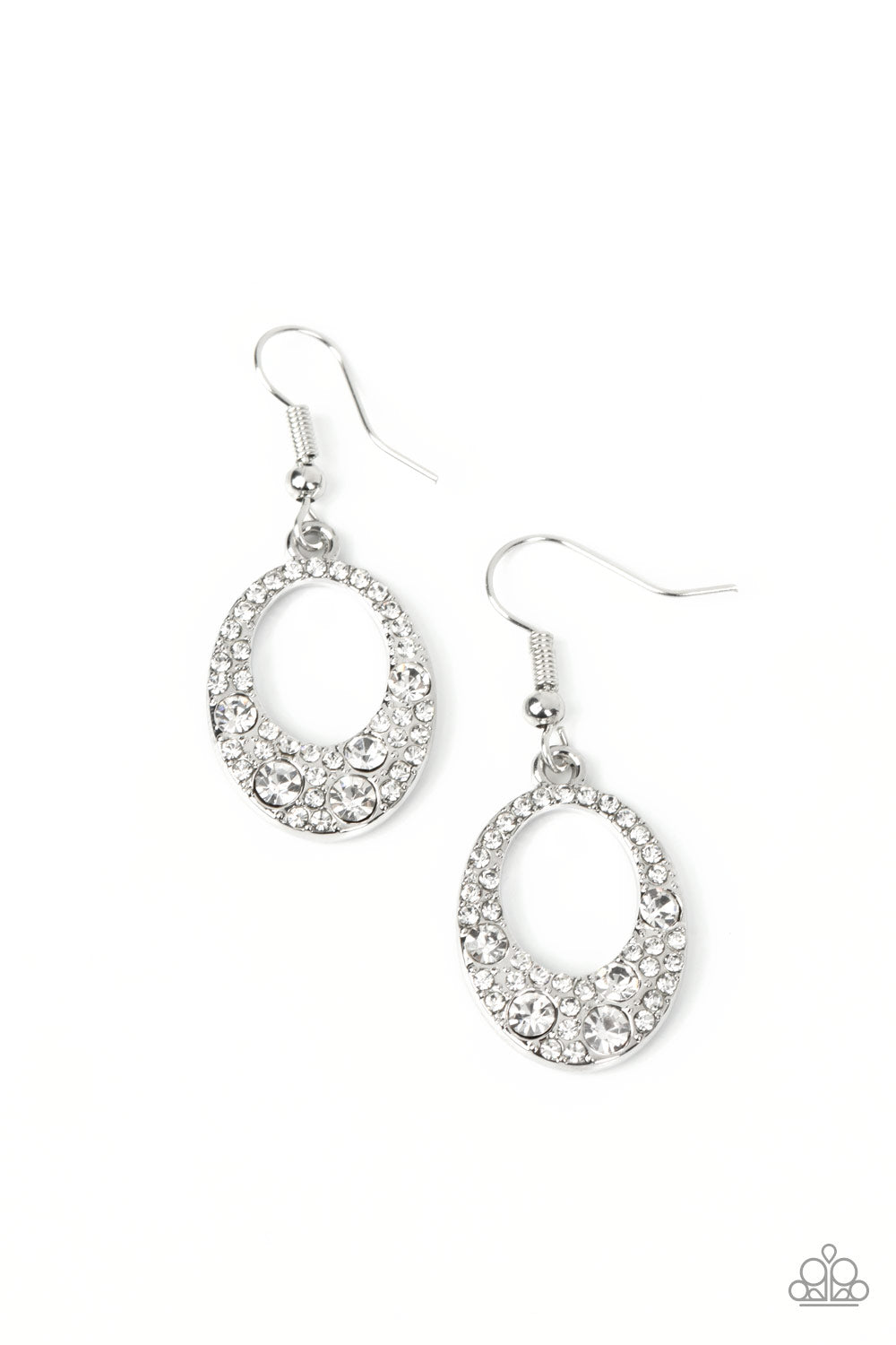 A smattering of mismatched white rhinestones encrusted the front of an oval silver frame, coalescing into a classic sparkle. Earring attaches to a standard fishhook fitting.  Sold as one pair of earrings.