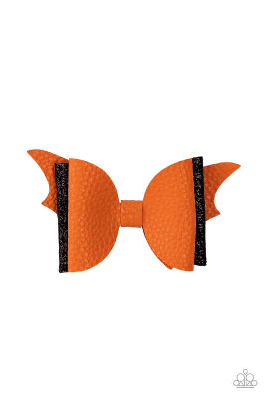 A soft orange leather bow and a sparkling black bow pair up to create a SPOOK-tacular impact over the silhouette of orange bat wings. Features a standard hair clip on the back.