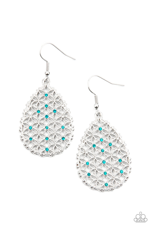 Dainty blue rhinestones are encrusted across the front of a silver teardrop frame filled with ornate tactile filigree, creating a whimsical lure. Earring attaches to a standard fishhook fitting.  Sold as one pair of earrings.