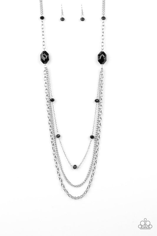 Infused with glassy black beads, a pair of glittery black gems gives way to layers of mismatched silver chains for a dazzling look. Features an adjustable clasp closure.

Sold as one individual necklace. Includes one pair of matching earrings.