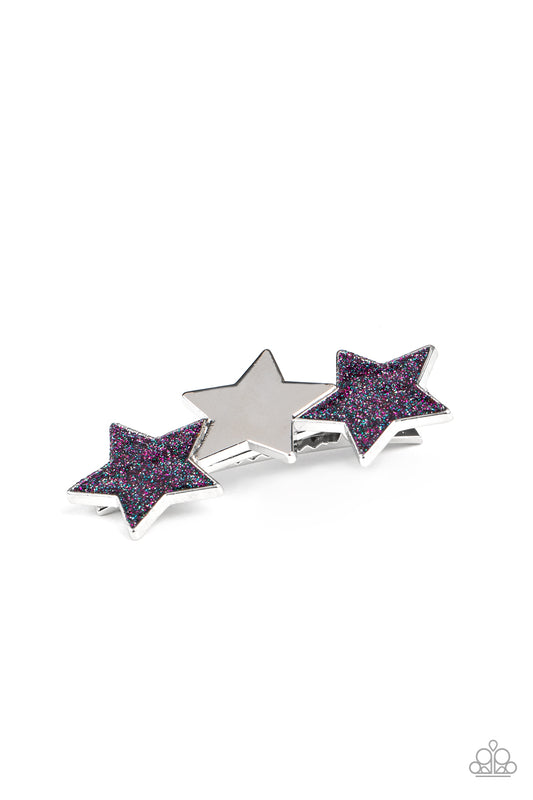 Painted in glittery blue and purple sparkles, a sparkly pair of stars flanks a shiny silver star, coalescing into a stellar centerpiece. Features a standard hair clip.  Sold as one individual hair clip.