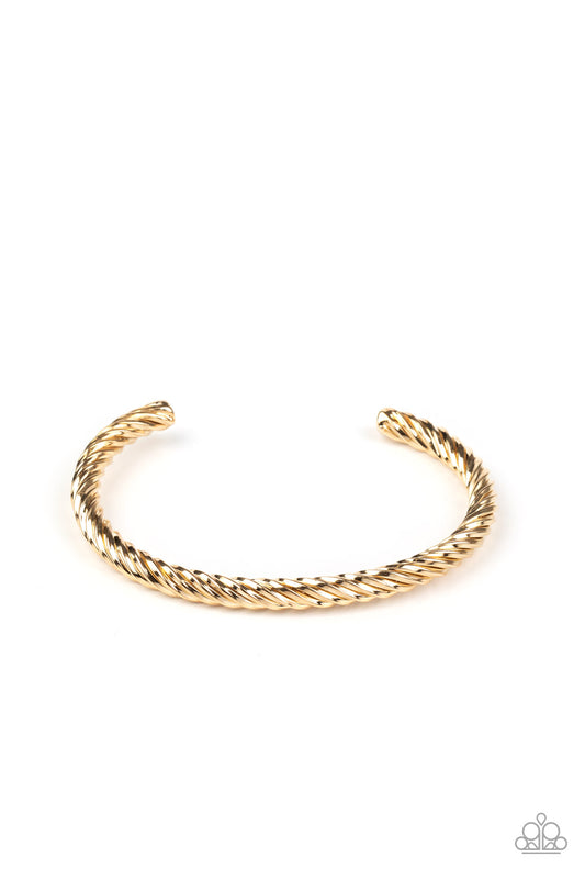 A series of glistening gold wire twists into a bold cuff around the wrist for an edgy look.  Sold as one individual bracelet.