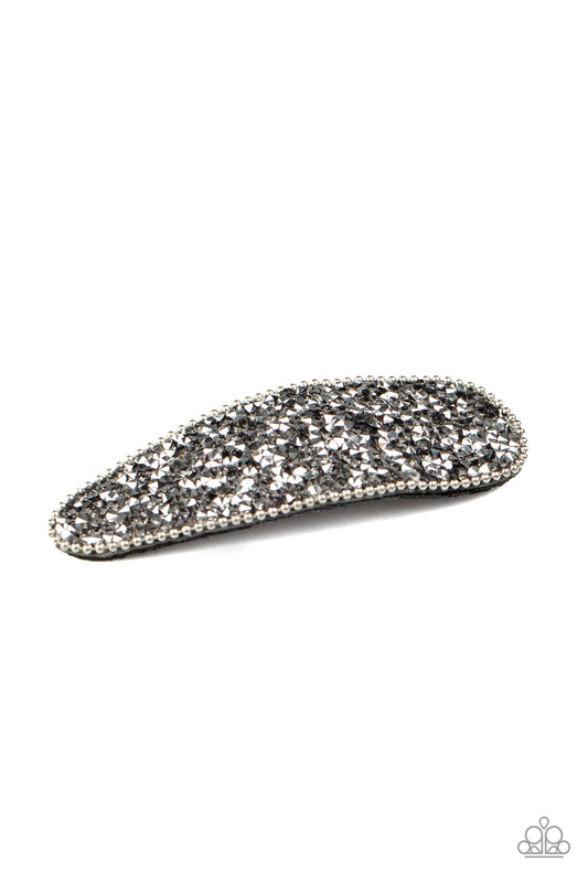 Bordered in shiny silver ball chain, a glittery collision of hematite rhinestones are encrusted across the front of a sparkly frame for a glamorous finish. Features a standard hair clip.  Sold as one individual hair clip.