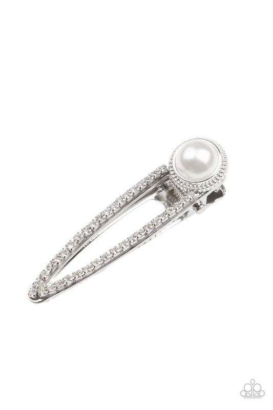 Dotted with a bubbly pearl fitting, a silver frame is encrusted in glassy white rhinestones for a glamorous finish. Features a standard hair clip on the back.  Sold as one individual hair clip.