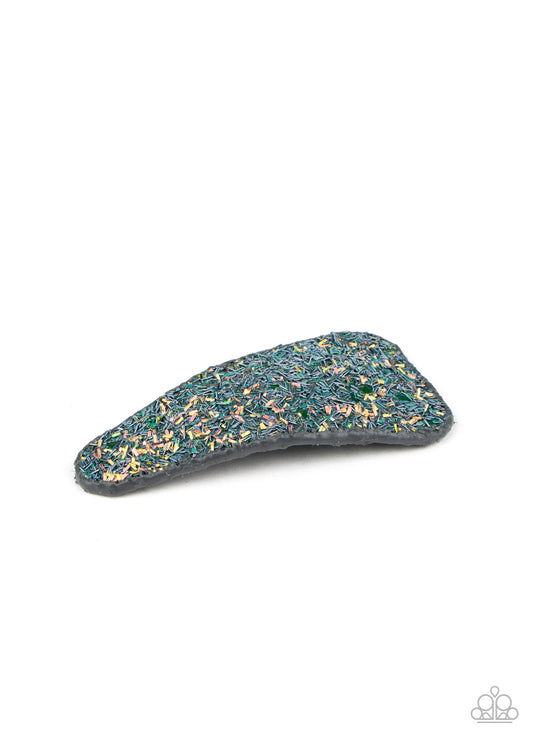 A collision of purple and iridescent sequins scatter across the front of a leather triangular frame, creating a glittery display. Features a standard snap clip on the back.  Sold as one individual hair clip.