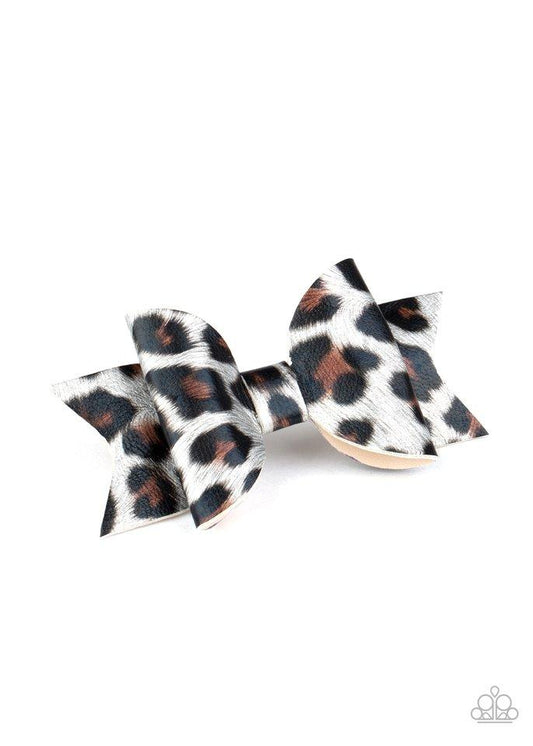 Featuring silver, brown, and black cheetah print, a shiny piece of leather delicately knots into a wild bow. Features a standard hair clip on the back.  Sold as one individual hair clip.